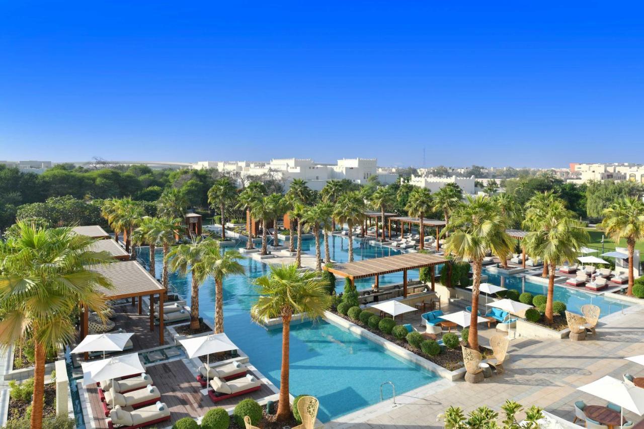 Al Messila, A Luxury Collection Resort & Spa, Доха Екстериор снимка The resort's pool area